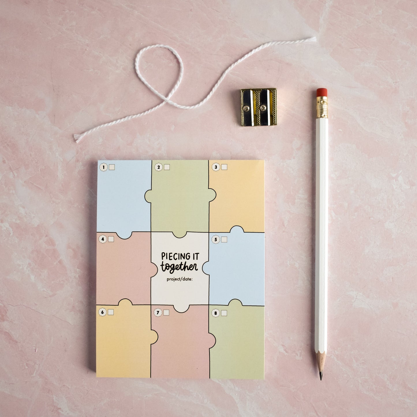 Piecing It Together Notepad